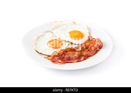 Fried eggs and bacon for breakfast isolated on white background. Stock Photo