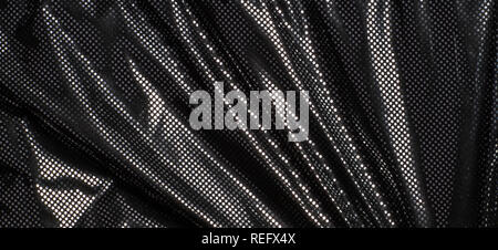 Gray black metalic silver polka dot fabric texture background Stock Photo