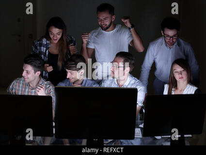 close up.the business team works on computers at night Stock Photo