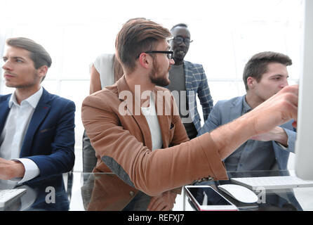 Programmer working in a software developing company office Stock Photo