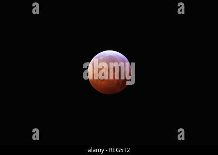 The "super blood wolf moon" is seen during a total lunar eclipse January 21, 2019, in Katwijk, Netherlands. Credit: Yuriko Nakao/AFLO/Ģ����ý Live News Stock Photo