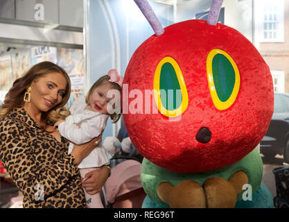 London, UK. 22nd Jan, 2019. Amy Childs, English television personality, model, businesswoman and fashion designer along with her Daughter, Polly, attend The Toyfair which opened at Olympia in Kensington, London and is open daily until the 24th January 2019. The Toy Fair is the UK's largest dedicated toy, game and hobby trade show which takes place annually. The toy industry's showcase welcomes more than 270 companies exhibiting thousands of products to visitors including retailers, buyers, media and the wider industry. Credit: Keith Larby/Alamy Live News Stock Photo