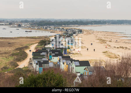 Beach huts in Winter, Mudeford Sandbank, Dorset, England, UK Stock Photo