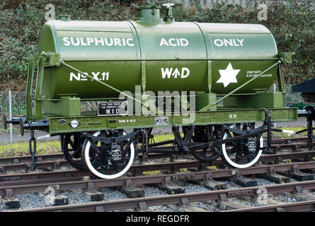 War Department Acid Tank on railway sidings in front of modern flats at Bristol's Harbourside in the UK Stock Photo