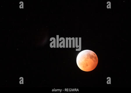 Lunar Eclipse on full moon in night sky. Stock Photo