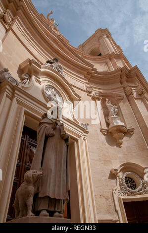 Street view of the front of Basilica of St Dominic in Merchants Street, Valletta, Malta. Stock Photo