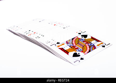 Angled view of a set of playing cards on white background, jack on top Stock Photo