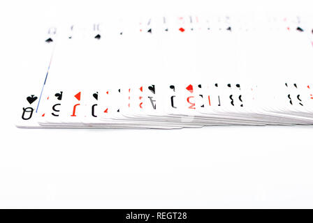 Angled view of a set of playing cards on white background, jack on top Stock Photo
