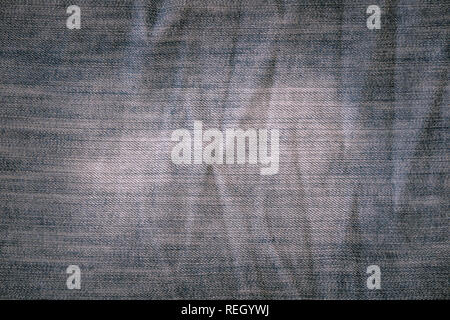 Texture on pants of texas with faded color in the middle Stock Photo