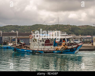 Shimen, Taiwan - October 03, 2016:  Fishing boats of different size  in Shimen Fishing Harbour Stock Photo