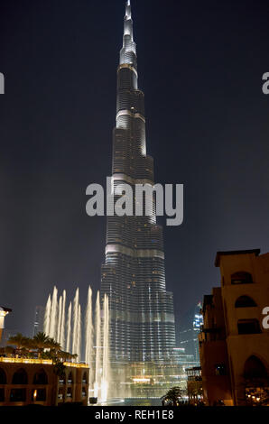 The tallest building in the world Burj Khalifa illuminated at night. Blue lights, luxury resort, Dubai cityscape at night. United Arab Emirates Stock Photo