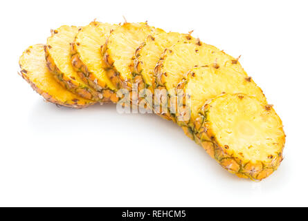 pile of ripe sliced pineapple isolated on white background Stock Photo