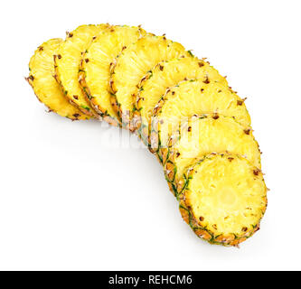 pile of ripe sliced pineapple isolated on white background Stock Photo