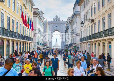 LISBON, PORTUGAL - OCTOBER 10, 2018: People on Augusta street in the day. Augusta Street with the Triumphal Arch - is the famous tourist attraction in Stock Photo