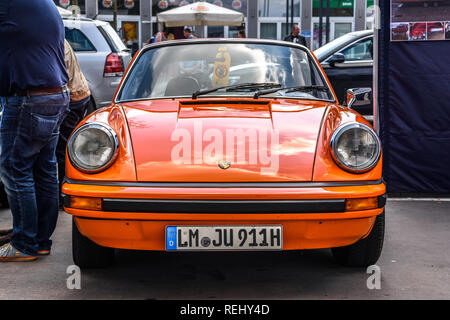 GERMANY, LIMBURG - APR 2017: orange PORSCHE 911 TARGA 1983
