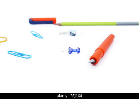Pen, pencil and paper pin. Isolated on the white background. Stock Photo