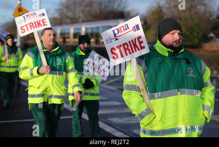Some of the 500 ambulance staff from the Psychiatric Nurses Association, who are staging a 10-hour strike, take part in a picket outside an ambulance station on Dublin's Davitt Road in a dispute over union recognition. Stock Photo