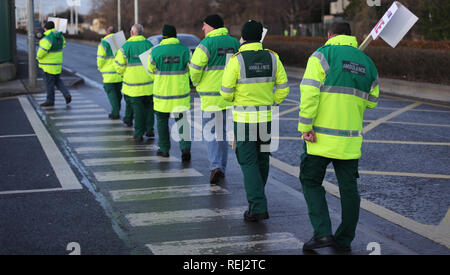 Some of the 500 ambulance staff from the Psychiatric Nurses Association, who are staging a 10-hour strike, take part in a picket outside an ambulance station on Dublin's Davitt Road in a dispute over union recognition. Stock Photo