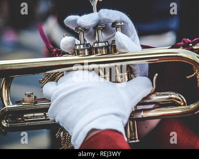 Hands and trumpet in the parade Stock Photo