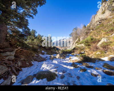 Photograph of a mountainous and snowy landscape on a sunny day in Andorra Stock Photo