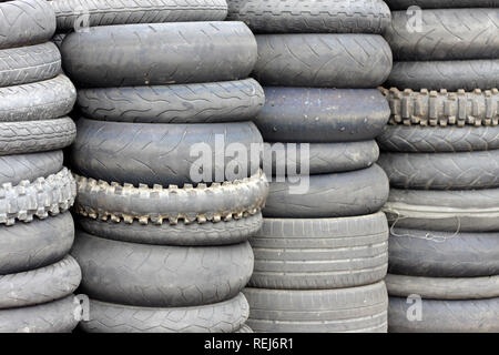 Stacks of used automobile tires Stock Photo