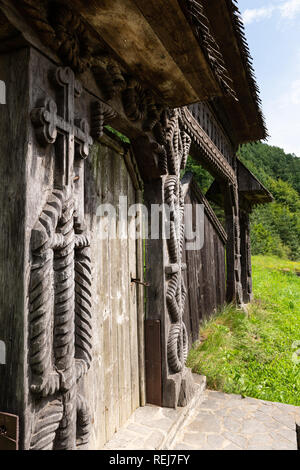 Barsana Monastery Architectural Detail - Traditional Wooden Carved Gate (Maramures, Romania). Stock Photo