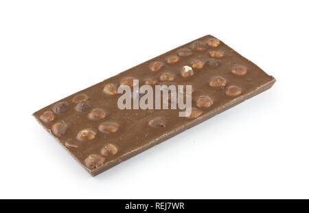 Milk chocolate with whole hazelnuts, isolated on white Stock Photo
