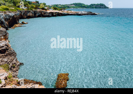 sandy bottom of a shallow blue bay near the island of Komodo in Indonesia. This area has some of the best scuba diving in the world Stock Photo