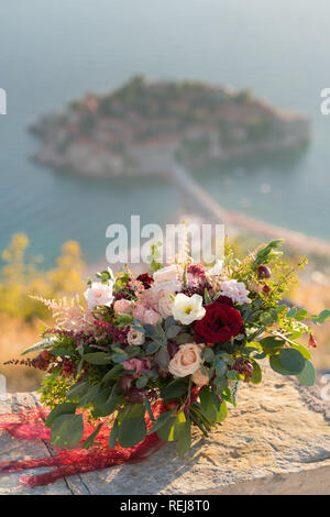 magnificent wedding bouquet stands on a stone against the background of magnificent wedding bouquet stands on a stone against the background of