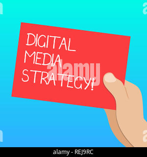 Handwriting text Digital Media Strategy. Concept meaning plan for maximizing the business benefits of assets Drawn Hu analysis Hand Holding Presenting Stock Photo
