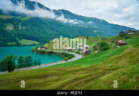 Landscape panorama with green nature in Lungern / Lungernsee lake, Swiss Alps, canton of Obwalden, Switzerland Stock Photo