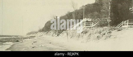 . Coastal changes, eastern Lake Michigan, 1970-1974. Coast changes. 8 May 1973 - Wide sand beach, vege- tated dune. Shack, on beach and steep bluff face are evi- dence of recent erosion.. 8 May 1976 - Wide beach covered with heavy minerals. Profile Line 11. This profile line is located in a heavily developed area. The line crosses a vegetated dune which accreted between October 1973 and December 1974. This is in contrast to earlier years. The lack of severe storms combined with a substantial beach probably accounted for the reduced erosion. The beach grew significantly between October and Nove Stock Photo