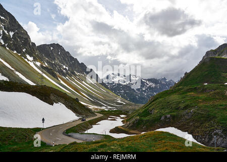 Road between high mountains, Switzerland Stock Photo