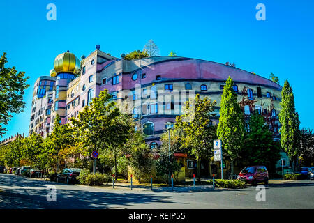 Colorful Hundertwasserhaus in Darmstadt in front of clear blue sky Stock Photo