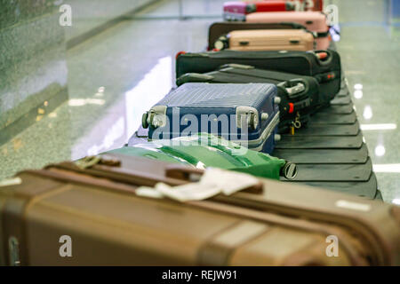 Suitcase and luggage in line in the international airport Stock Photo