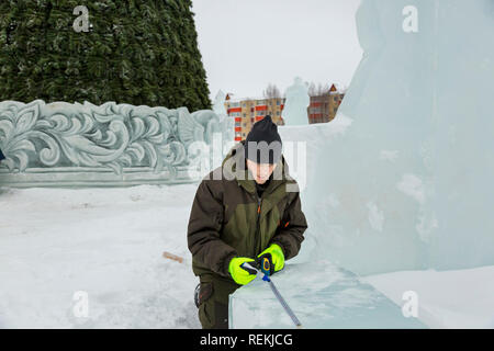 Workman assembler marks the ice block with the help of roulette Stock ...