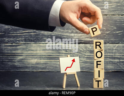 Increase profits and investment fund. Concept of business success, financial growth and wealth. salary increase. Hand of a businessman, leader or boss Stock Photo