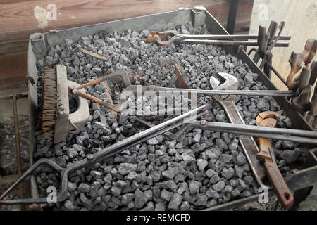 Blacksmith forge with tools Stock Photo