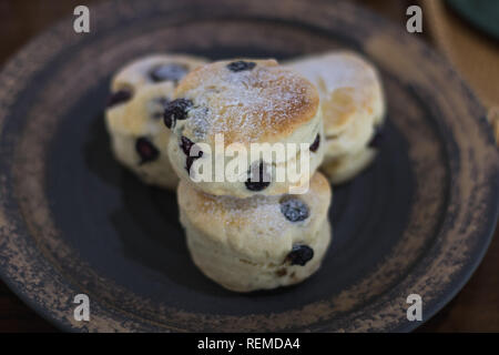 scones on ceramic dish in coffee cafe Stock Photo