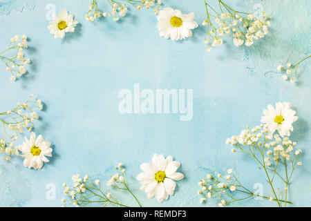 Easter background with spring flowers. Top view flat lay background with. Stock Photo