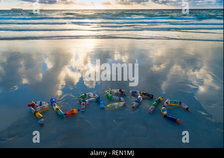 MIAMI - SEPTEMBER, 2018: Plastic awareness message made from consumer trash found on the beach illustrating the current environmental pollution crisis Stock Photo