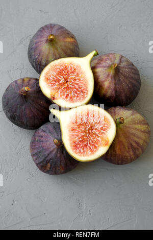 Fresh figs on gray background, top view. Close-up. Stock Photo