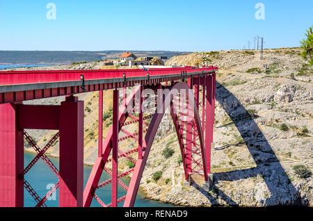 Red Iron Road Bridge over the canal. Croatia. Stock Photo