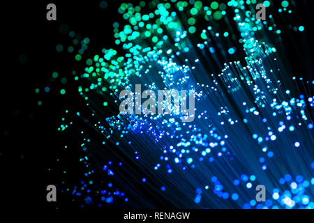 Abstract high-tech background of glowing fiber optic cable Stock Photo