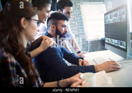 Young architects working on project in office Stock Photo