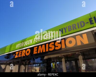 Close-up of text reading Hydrogen Fuel Cell Zero Emission on the side of a city bus in Albany, California, indicating that the bus is powered by a hydrogen fuel cell technology, December 13, 2018. () Stock Photo