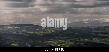 Panorama of snow covered mountains of Snowdonia, North Wales, UK Stock Photo