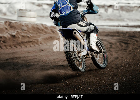 rider enduro motorbike riding on winter track Stock Photo