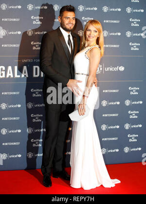 Sergio Romero and wife Eliana Guercio during the red carpet arrivals for the Manchester United United for Unicef Gala Dinner at Old Trafford, Manchester. Stock Photo