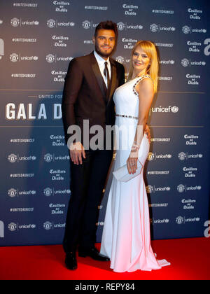 Sergio Romero and wife Eliana Guercio during the red carpet arrivals for the Manchester United United for Unicef Gala Dinner at Old Trafford, Manchester. Stock Photo